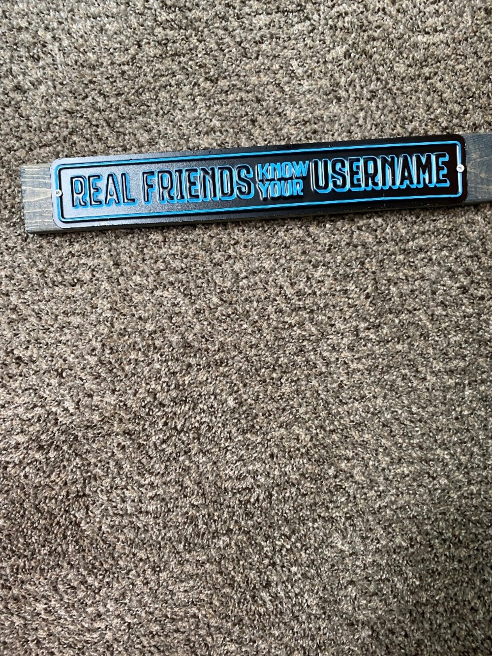 Handmade sign “Real Friends Know Your User Name”